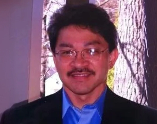 Dr. Armand del Rosario
